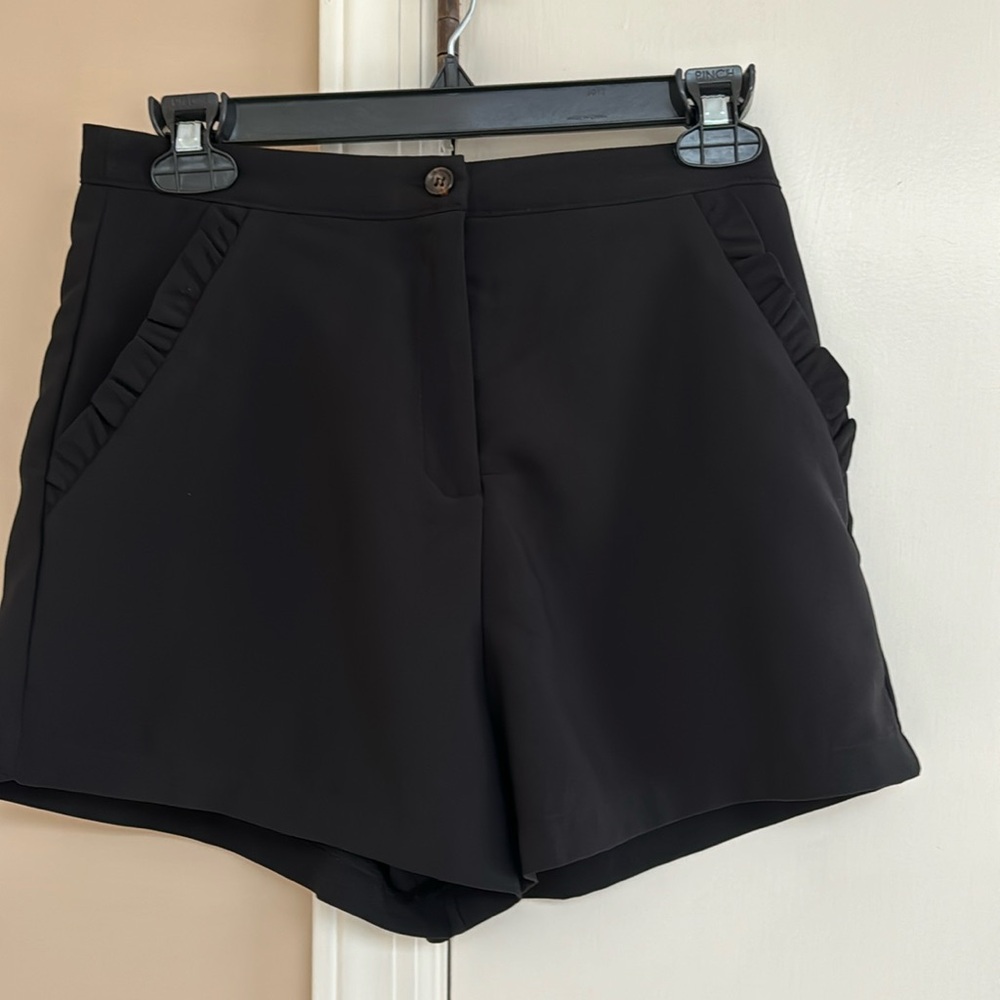 She & Sky black shorts